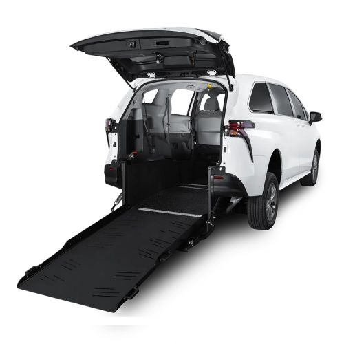 White accessible SUV minivan with rear ramp fully deployed on white background